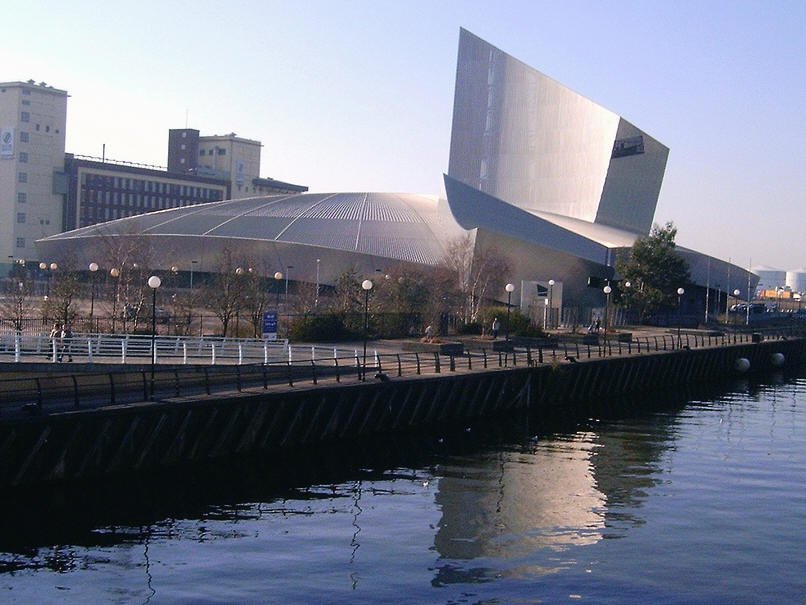 Imperial War Museum North Manchester Daniel Libeskind building at Salford Quays with Manchester Ship Canal waterfront views