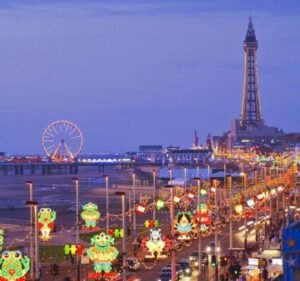Blackpool Tower and promenade on a day trip from Manchester featuring seaside attractions beaches and family entertainment