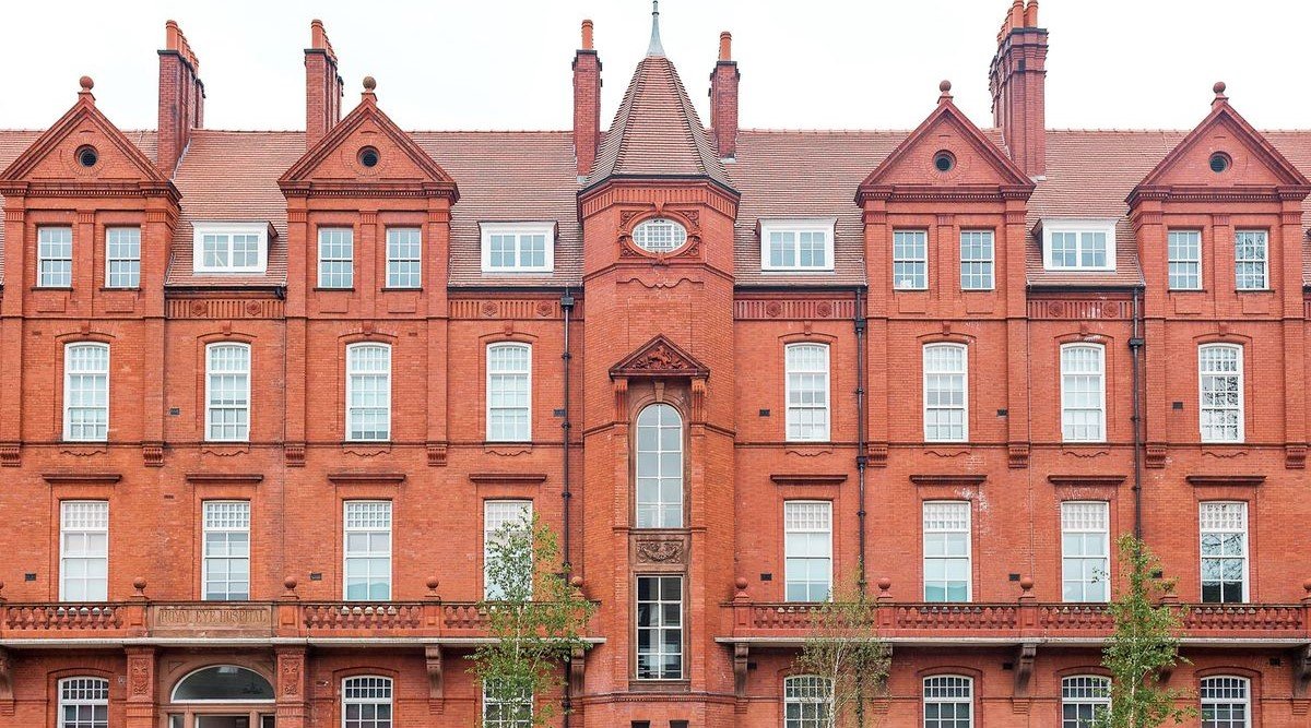 Whitworth Art Gallery Manchester exterior showing Victorian building with glass extension set within Whitworth Park on Oxford Road Manchester
